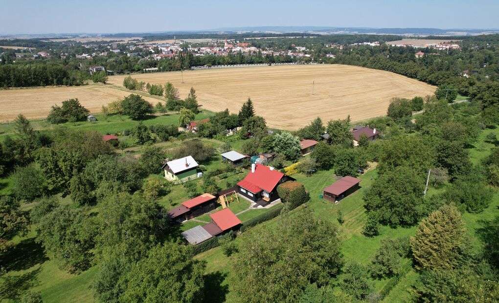 Rodinný dům se zahradou a sadem